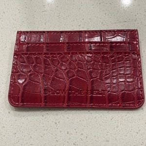 Below the belt red wallet